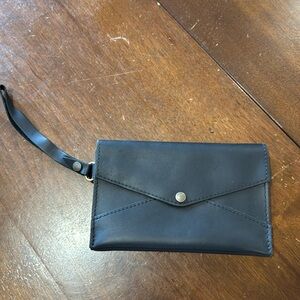 Envelope fold clutch